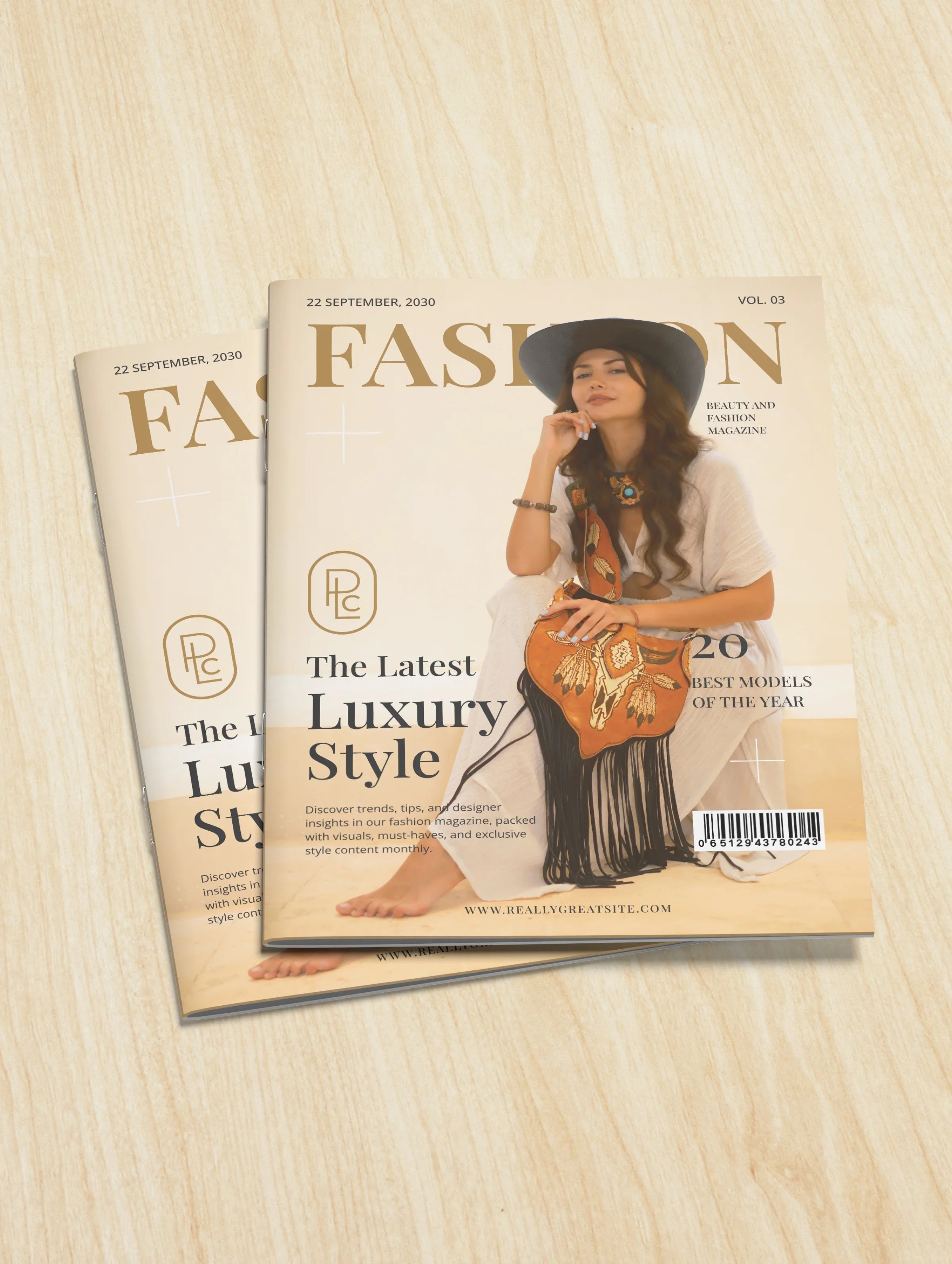 Pacific Luxe Creative brand photography two fashion magazines styled on a wooden surface with a soft luxury glow.