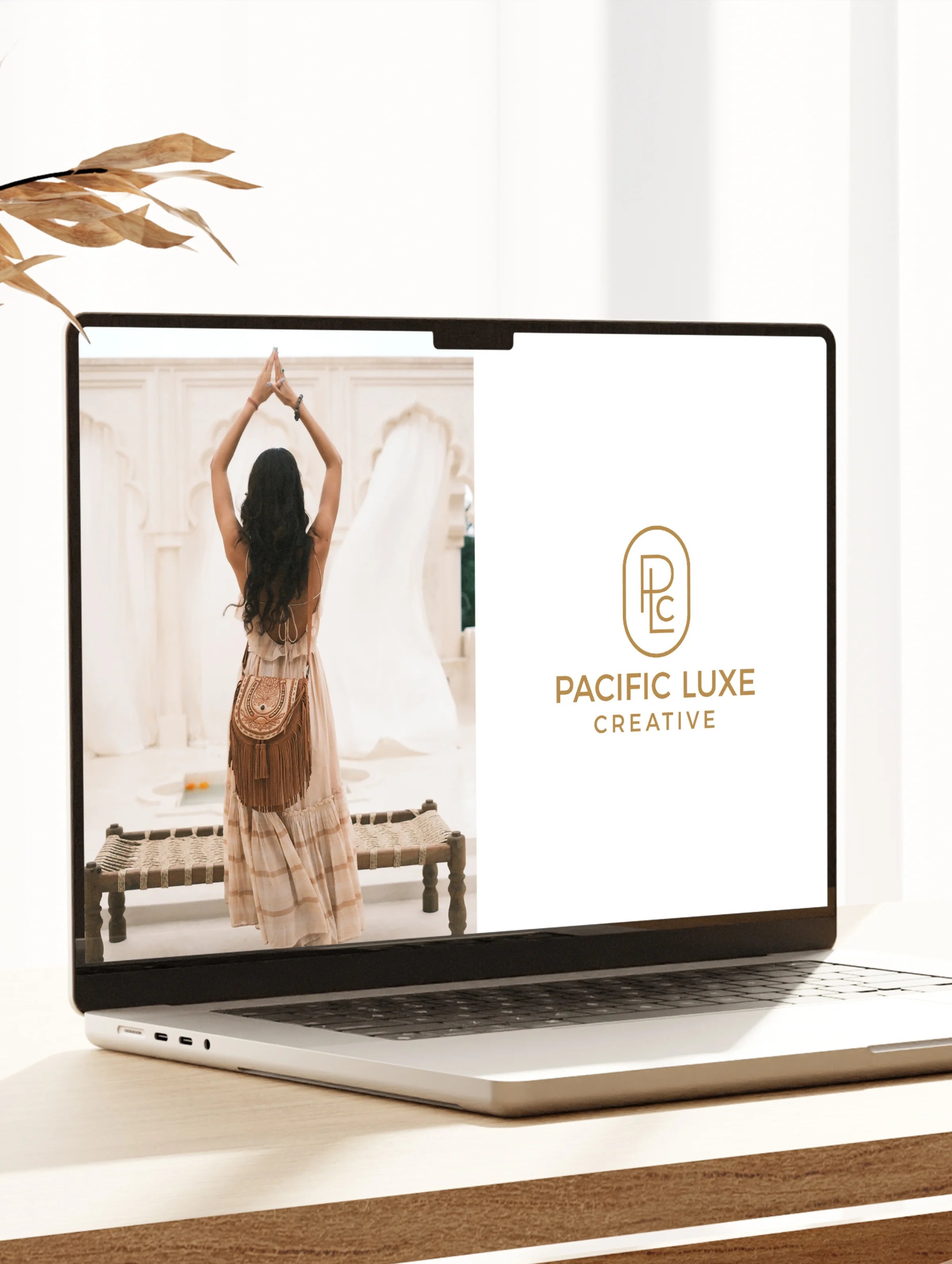 Luxe product photography by Pacific Luxe Creative featuring elegant portrait of a woman in a dress with brand logo and Perth-inspired tones.