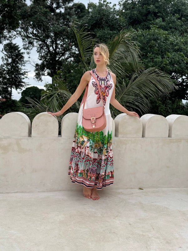 Pacific Luxe Creative brand photography featuring a model in flowing resort wear captured under the Bali Paradise Shore glow.