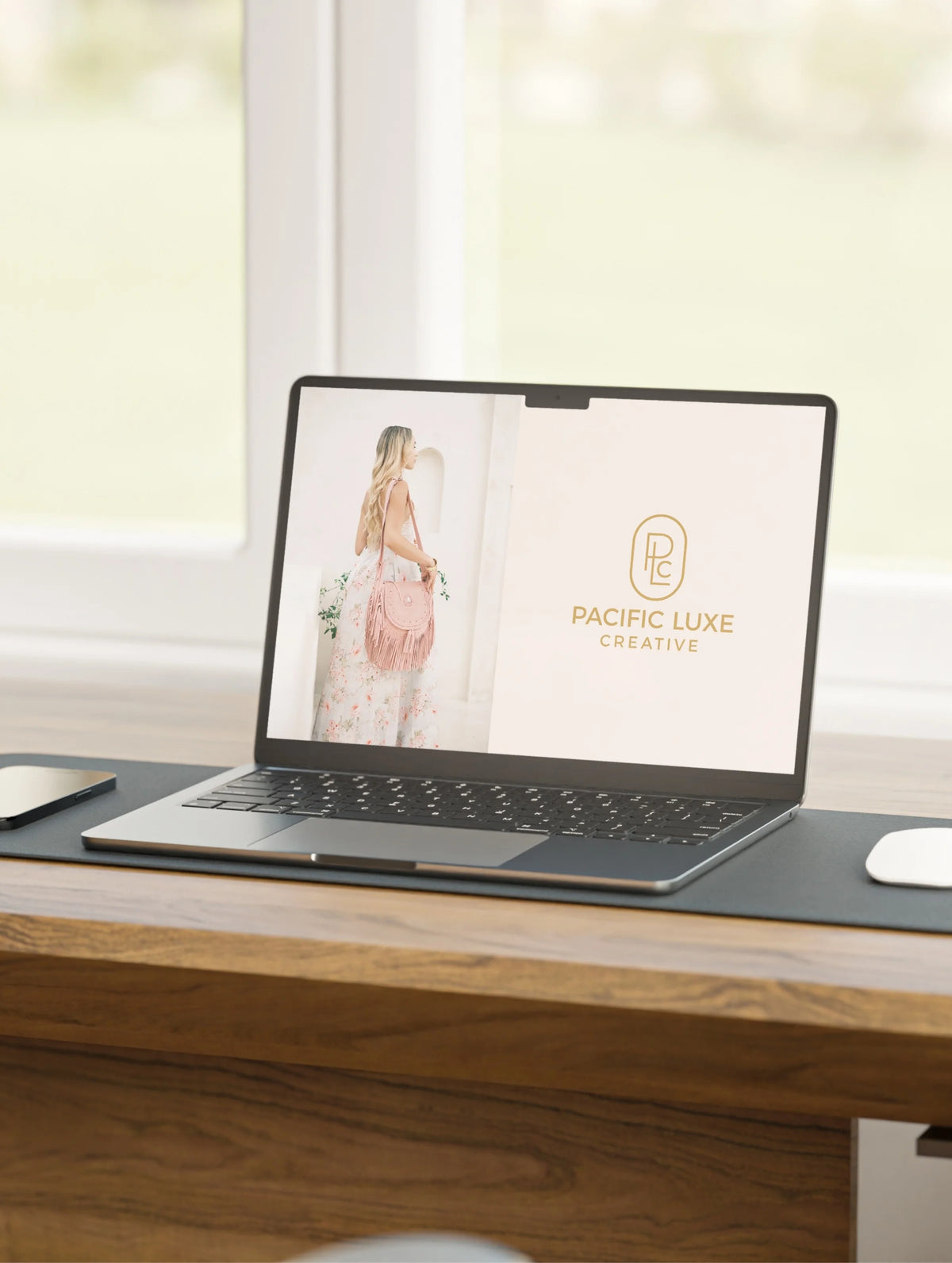 Pacific Luxe Creative luxury branding modern laptop scene styled with golden sunset glow and Bali-inspired sophistication.