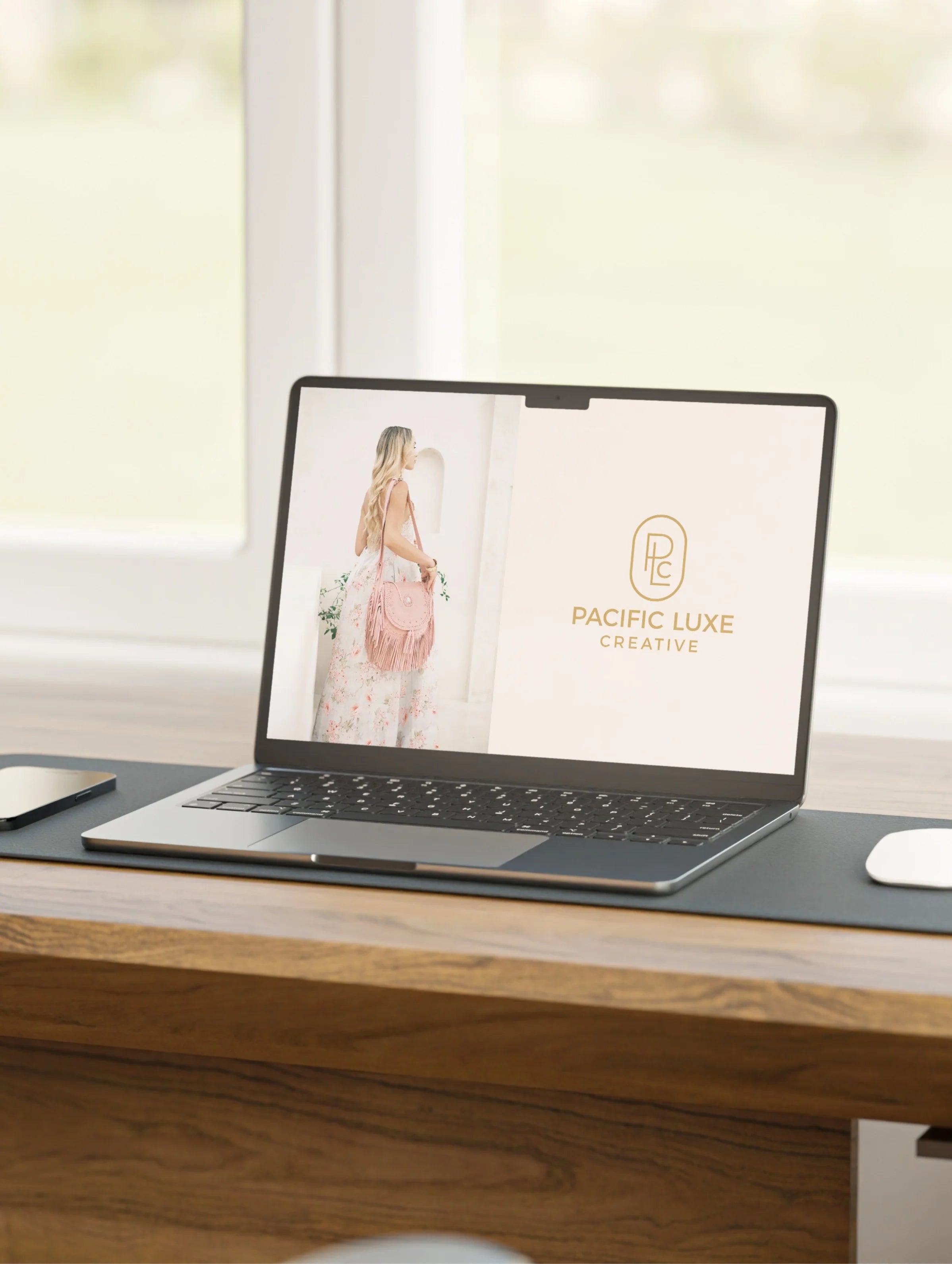 Pacific Luxe Creative luxury branding modern laptop scene styled with golden sunset glow and Bali-inspired sophistication.